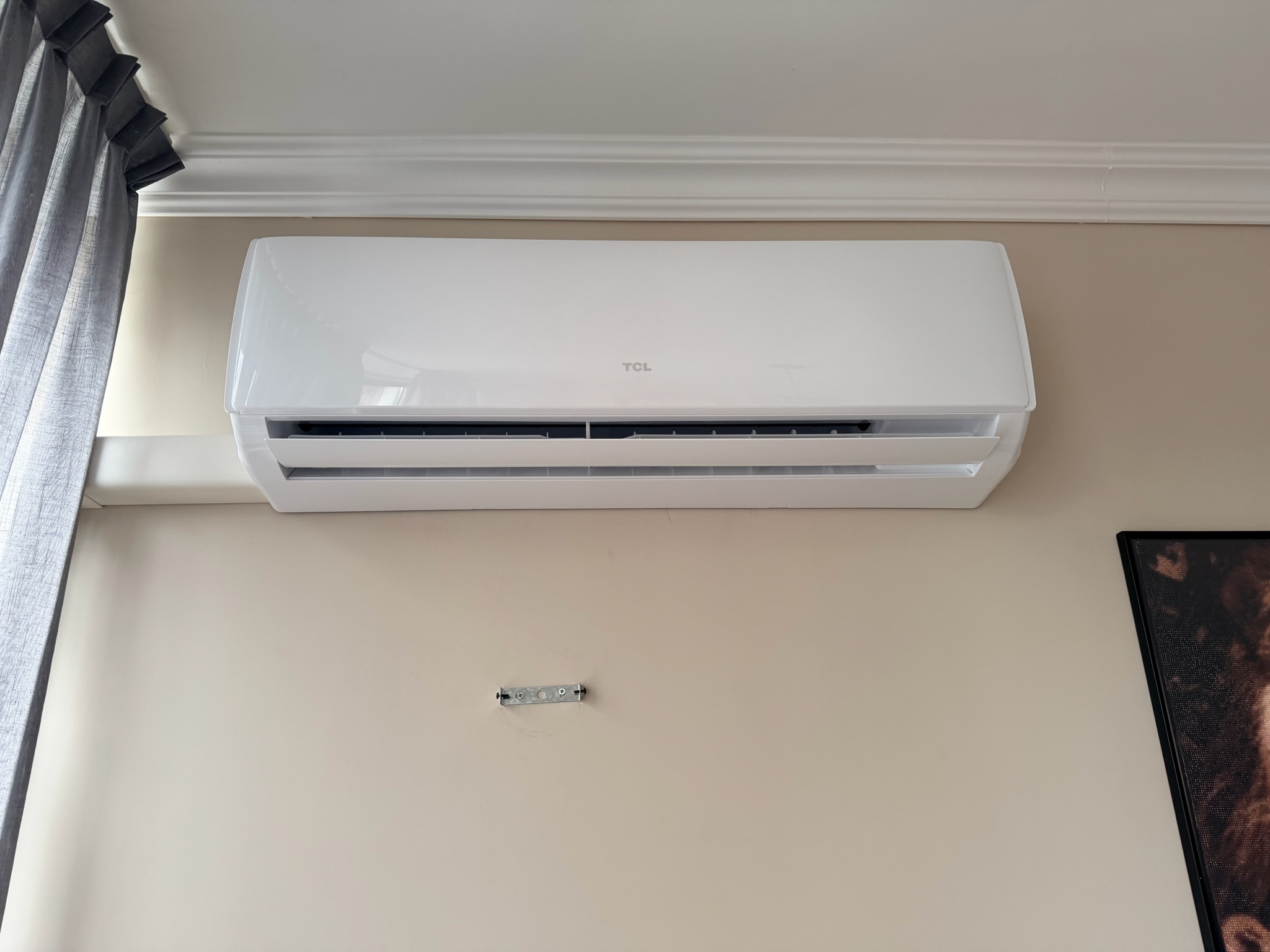 TCL binnenunit — woning met sierlijst